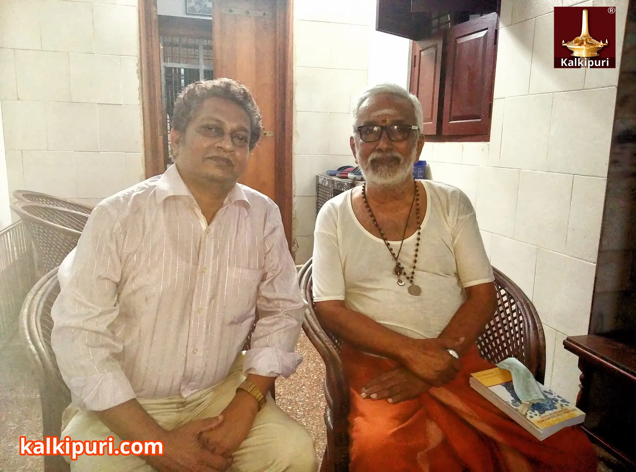 Mukundaraj handed over his Autobiography (EXPLORING THE UNEXPLORED : THE ADVENT OF KALKI) to Chandrahasan.